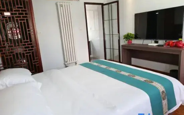 Woqiao Longju Hotel