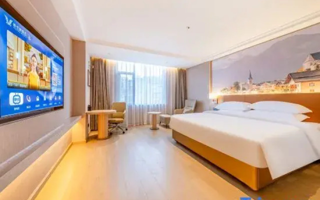 Vienna Hotel (Yuxi Xinping Gasa Flower Street)