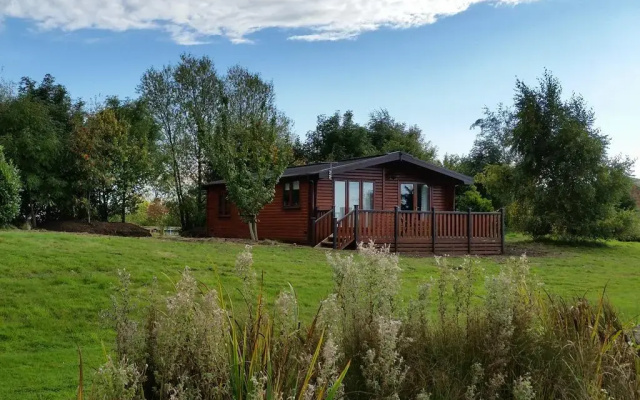 The Log Cabin Glebe Farm