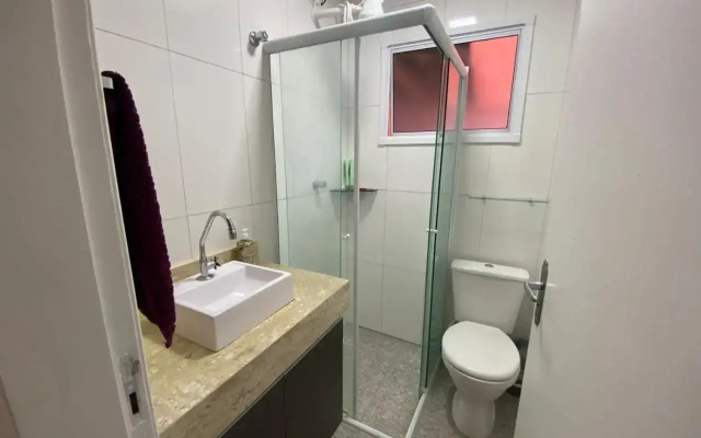 Casa em Bertioga condomínio 250 metros da praia