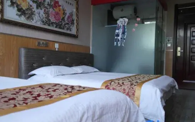 Home Huayi Hotel (Mudanjiang Normal University)