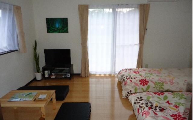 Отель Cottage Kutsuroki Япония, Якусима - отзывы, цены и фото номеров - забронировать отель Cottage Kutsuroki онлайн комната для гостей