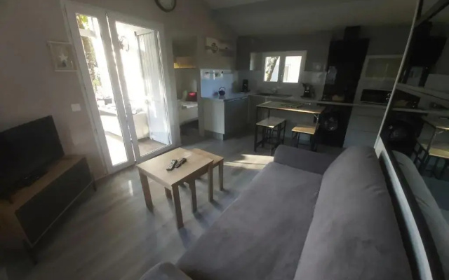 Chalet T3/clim/wifi/pkg/terrasse/15 min plages