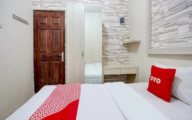 OYO Life 90606 Glass House Citraland Syariah