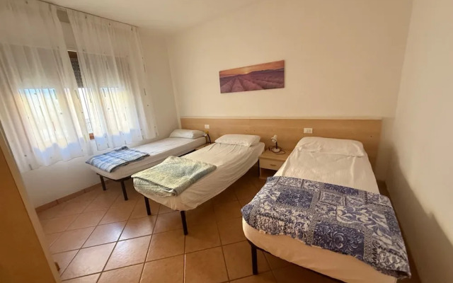 Cozy Flat With Private Parking in Rosolina Mare