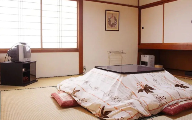 Отель Zao Onsen Pension Bokunouchi