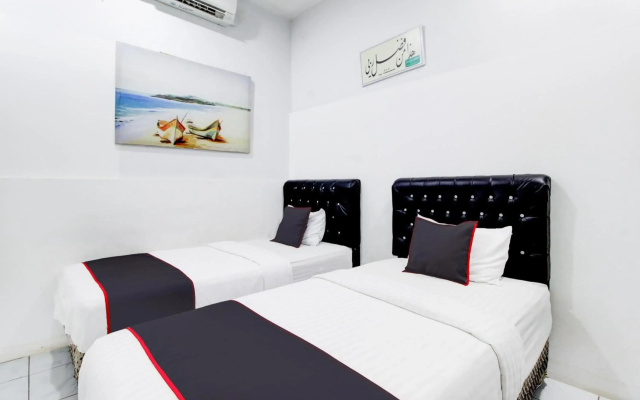 Hotel O Jalan Jenderal Sudirman Near Imam Bonjol Square Formerly Nelvi Guest House
