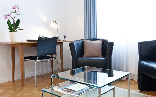 Апартаменты Jenatsch Apartments Цюрих комната для гостей