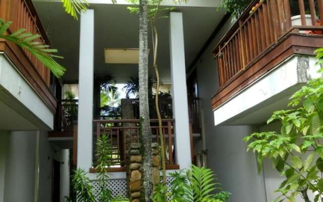 Отель Appartement Sunset Beach Carlton Holiday home 2 Французская Полинезия, Пунаауиа - отзывы, цены и фото номеров - забронировать отель Appartement Sunset Beach Carlton Holiday home 2 онлайн вид на фасад