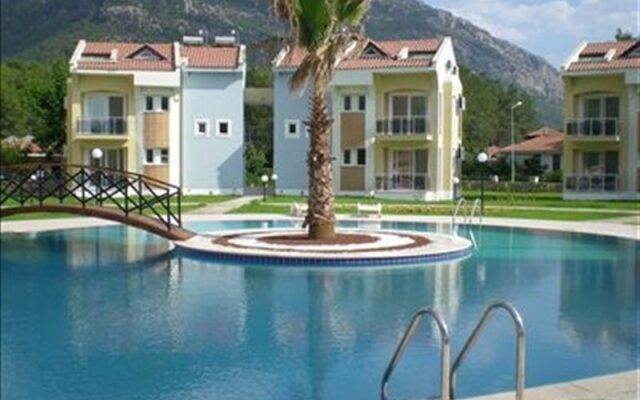 Апартаменты Hisar Garden Apartments Олудениз вид на фасад