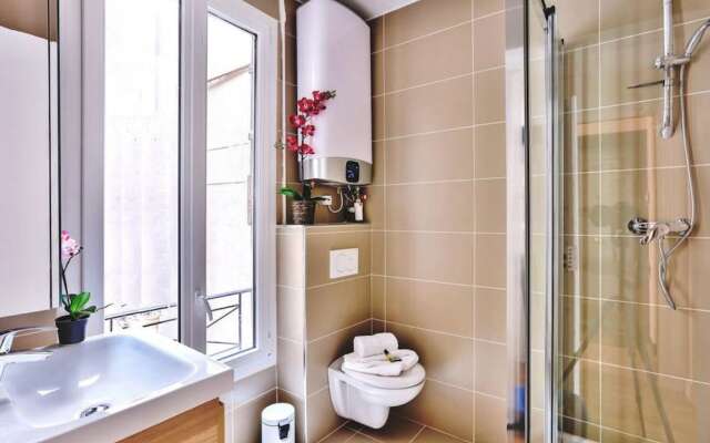 Апартаменты Family Apartment "buttes Chaumont" Париж ванная