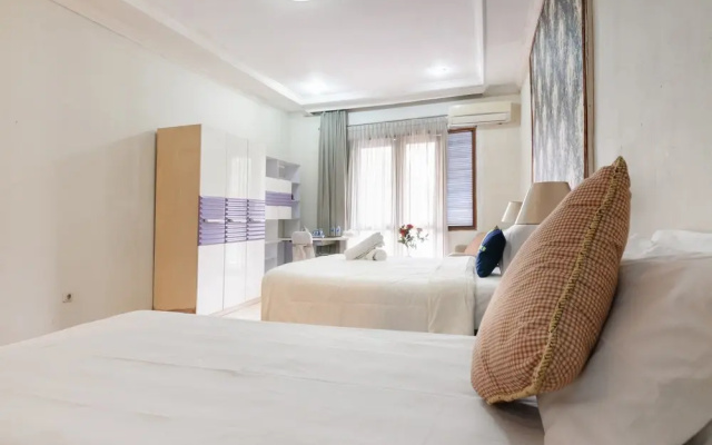 Urbanview de’ Dharmawangsa Suite