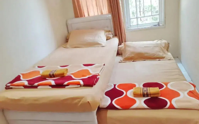 Spot On 3988 Kost Carmelia Baranangsiang Syariah