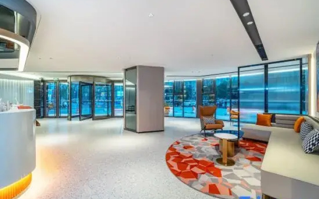 Guzhen Romantic Journey Hotel (Touzhi Building)