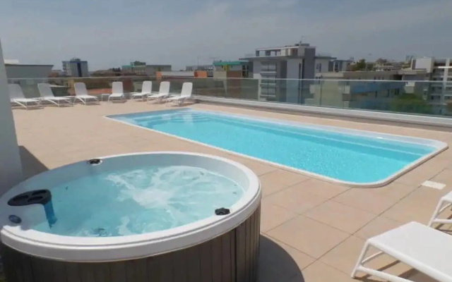 Modern Home Featuring a Rooftop Pool