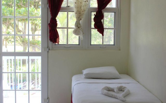 Sea Breeze Inn in Massacre, Dominica from 106$, photos, reviews - zenhotels.com guestroom