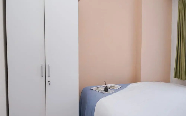 Good Place and Homey 2BR at Apartment Serpong Greenview