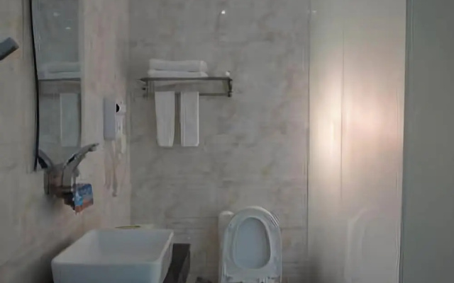 Lecheng Business Hotel