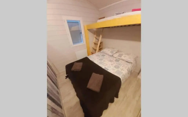 Chalet T3/clim/wifi/pkg/terrasse/15 min plages