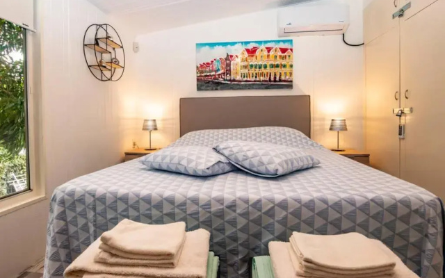 Appartement met zwembad en prachtige tuin