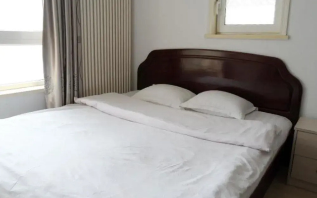 Dalian Jiujiuyuan Hotel Apartment