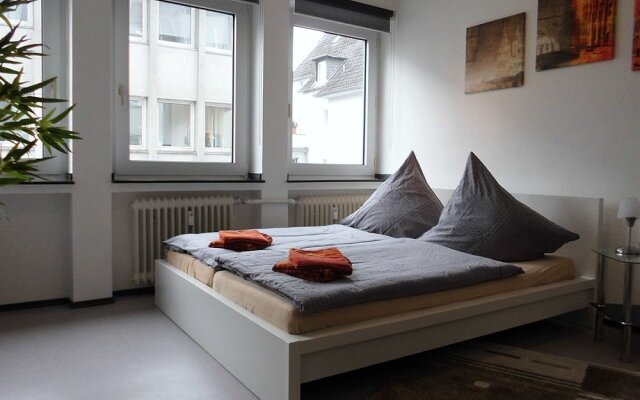 Отель Star Apartments Cologne - Ecke Brunostrasse Германия, Кёльн - отзывы, цены и фото номеров - забронировать отель Star Apartments Cologne - Ecke Brunostrasse онлайн комната для гостей