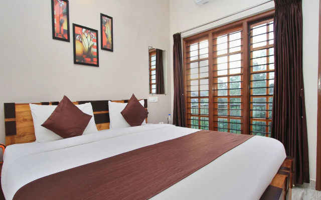 Treebo Avyukta Stay, 1.5 km to Madikeri Fort