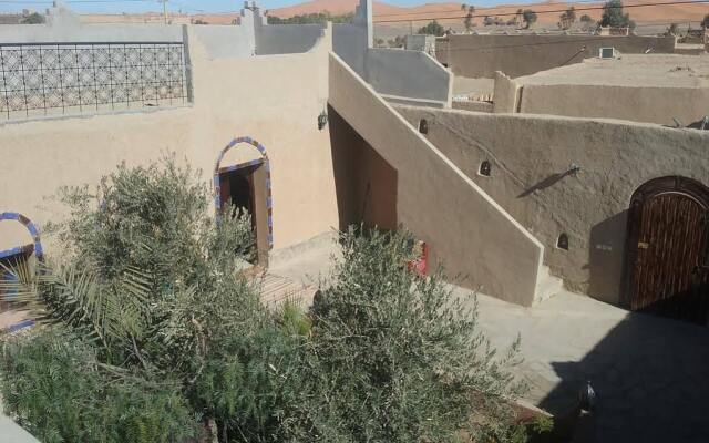 Отель Casa Hassan Марокко, Мерзуга - отзывы, цены и фото номеров - забронировать отель Casa Hassan онлайн вид на фасад