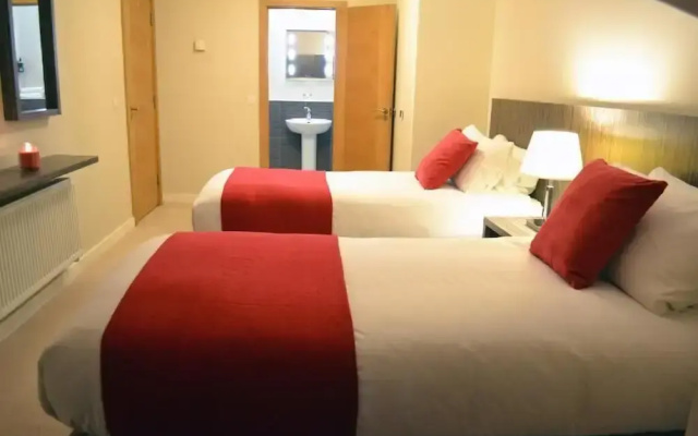 Carrick Plaza Suites & Apartments