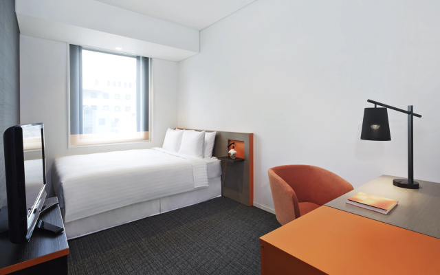 Отель Courtyard by Marriott Tokyo Station