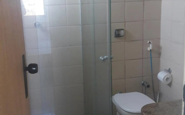 Apartamento Guarapari pé na areia com Wi-Fi e Garagem