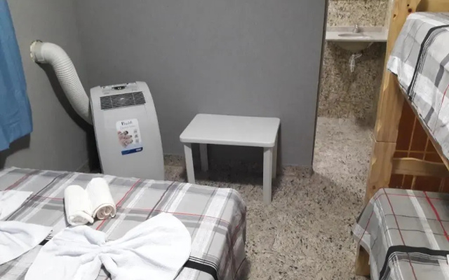 Hostel Falcão-Suites Privativas com Ar Condicionado
