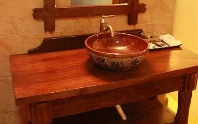 Xishuangbanna Fengweizhu Inn