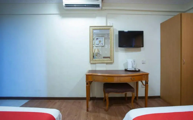 Capital O Hotel Grand Orchard
