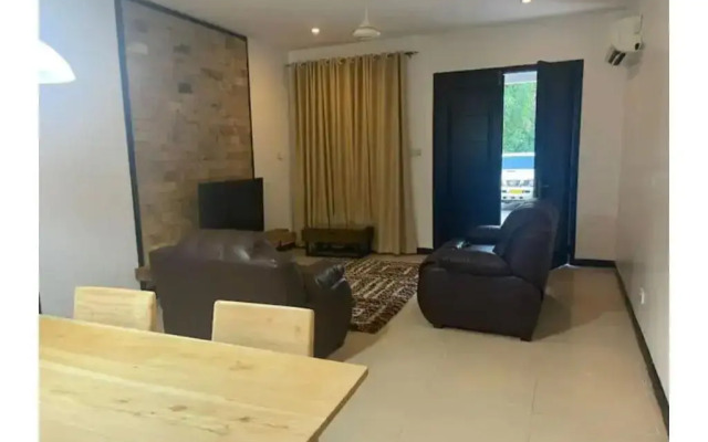 Entire 2 bedroom house with free wifi in Masaki