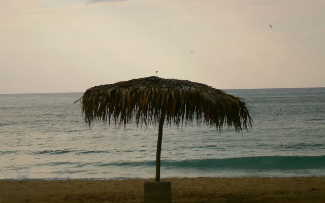 Sunset On The Beach Resort