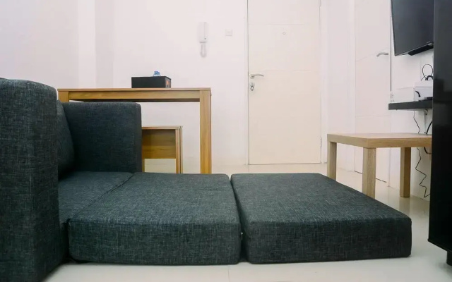 2BR Minimalist Bassura City Apartment By Travelio
