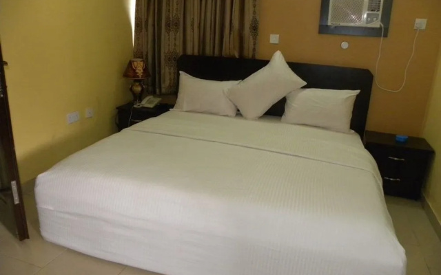 Grandy Suites Hotel