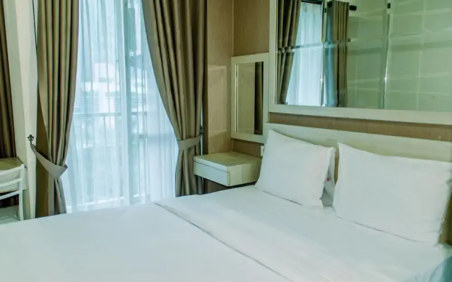 Homey And Warm Studio Room At Tifolia Apartment