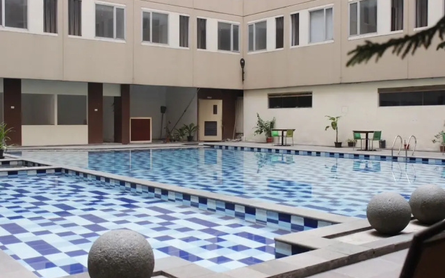 Comfy Studio Apartment at Emerald Tower