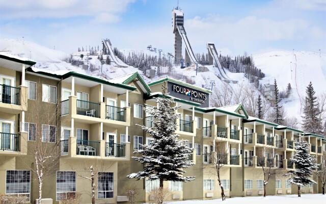 Отель Four Points by Sheraton Hotel & Suites Calgary West Канада, Калгари - отзывы, цены и фото номеров - забронировать отель Four Points by Sheraton Hotel & Suites Calgary West онлайн вид на фасад