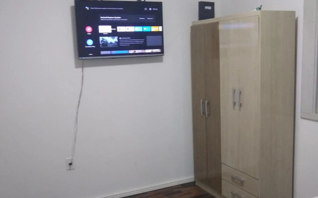 Quarto aconchegante em Apê, no Calçadão