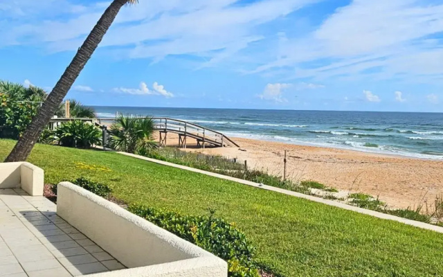 Barry Palm 202 by Distinctive Beach Rentals
