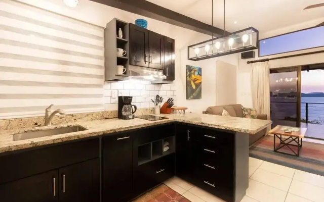 Modern Studio Apartment with Covered Balcony, Full Kitchen, and Stunning Ocean Views