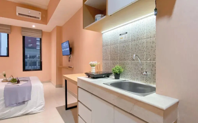 Peach Tone Studio At Evenciio Margonda Apartment