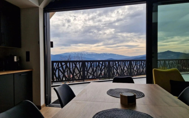 House With a Garden and a View of the Mountains