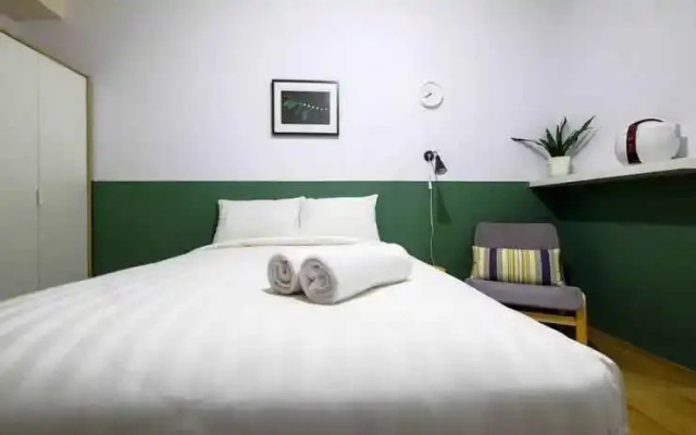 Bright and Clean Studio Apartment Serpong Greenview By Travelio