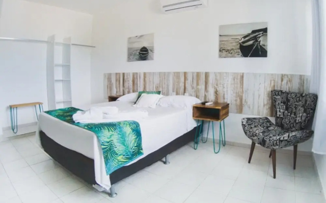 Casa Turquesa na Praia de Ponta Negra Por Carpediem