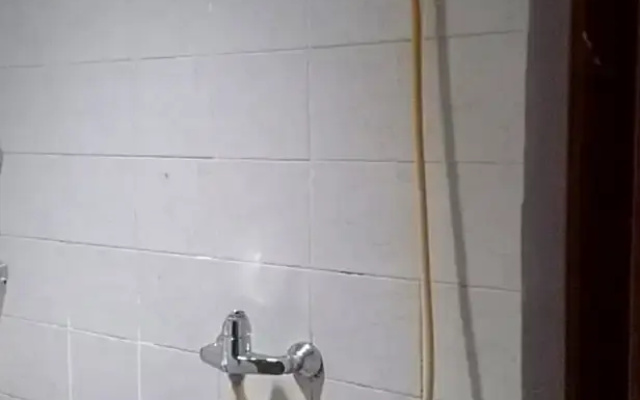 Super OYO 91104 Griya Mitra Residence