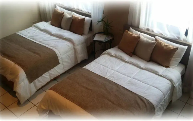 Rainforest & Ocean View Inn At Carabali